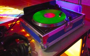Vinyl DJ Experience by DJ Diamond Dust. Fluorescent Vinyl on the turntable.