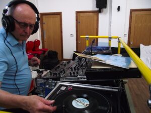Vinyl DJ Experience by DJ Diamond Dust. Cue  in the needle on the record rather then click a digital track.