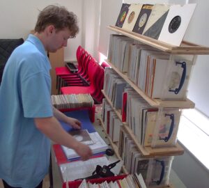 Vinyl DJ Experience by DJ Diamond Dust. Dean filing the 7" singles stock.